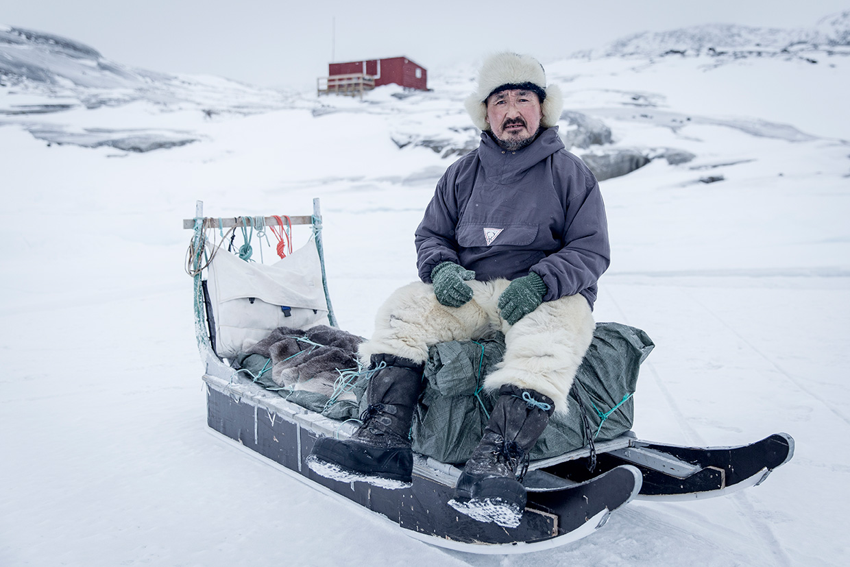 Dog sledding in Greenland. Photo by Mads Pihl
